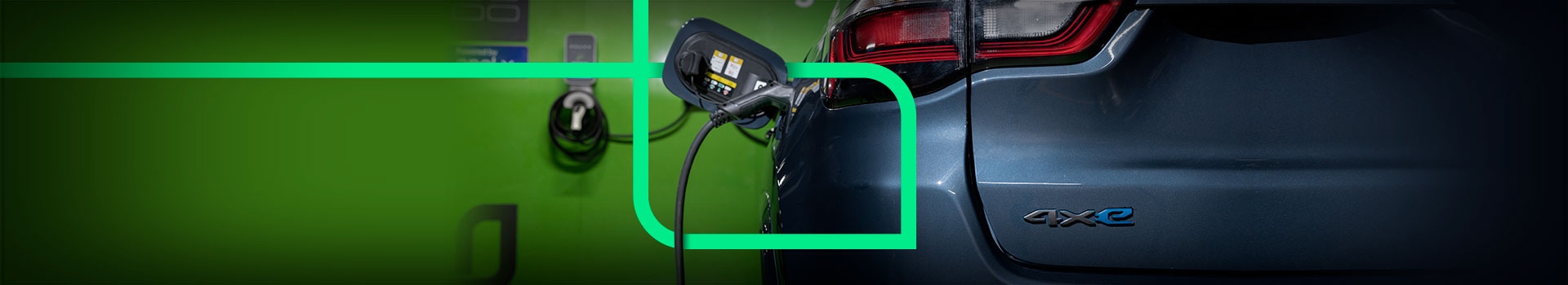 A imagem mostra um veículo elétrico sendo recarregado